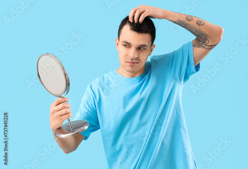 Young man with hair loss pr...