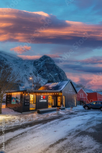 norway lofoten beach red houses clouds in the air sunset light and colors
