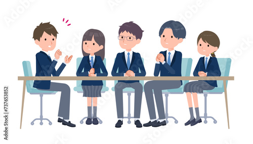 真剣に会議する学生たち　B