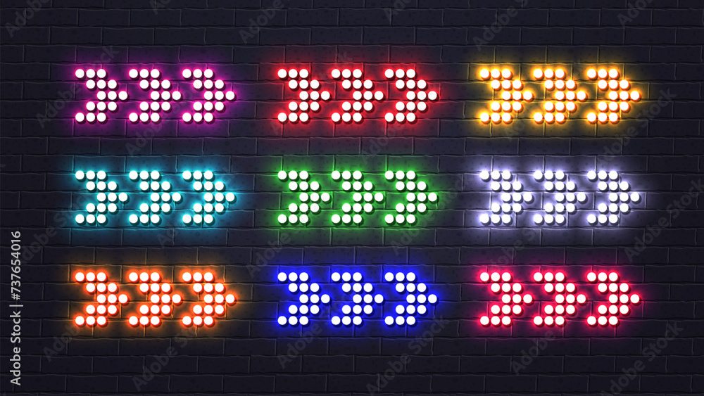 A set of bright shiny LED neon pointer arrows made of round lamps on a brick wall background. A set of bright shiny LED neon pointer arrows made of round lamps on a brick wall background.