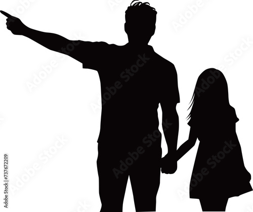 少女と手をつないで指をさす男性のシルエット