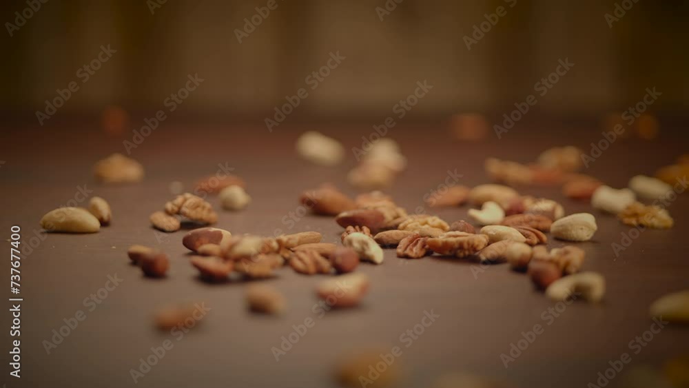 Mixed Nuts of Almonds Pecan Walnuts Cashews Hazelnuts on Wooden Table Mixed Nuts of Almonds Pecan Walnuts Cashews Hazelnuts on Wooden Table