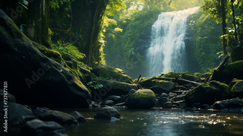 Tranquil waterfall in a lush forest with sunlight filtering through the foliage, serene nature scene.