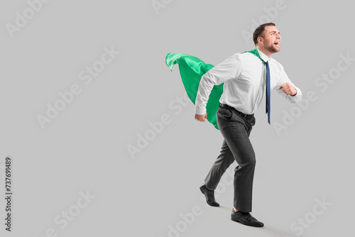 Businessman with superhero ...