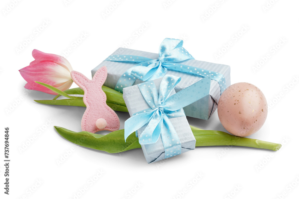 Easter egg, fabric bunny, tulip and gifts on white background Easter egg, fabric bunny, tulip and gifts on white background