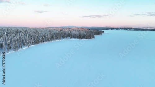 Lapland Frozen Lake At Pyhä Luosto In Finland, Winter Wonderland. Aerial Drone Shot photo