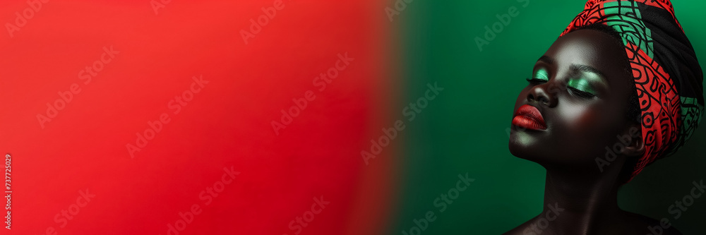 A portrait of an African woman with a vibrant headscarf on a split red and green background with ample copy space for text A portrait of an African woman with a vibrant headscarf on a split red and green background with ample copy space for text