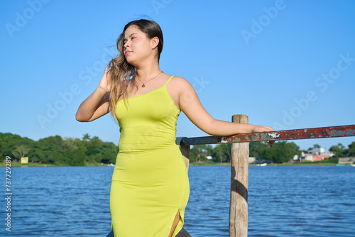Green Apple dress, latina with blue sky and posing 01