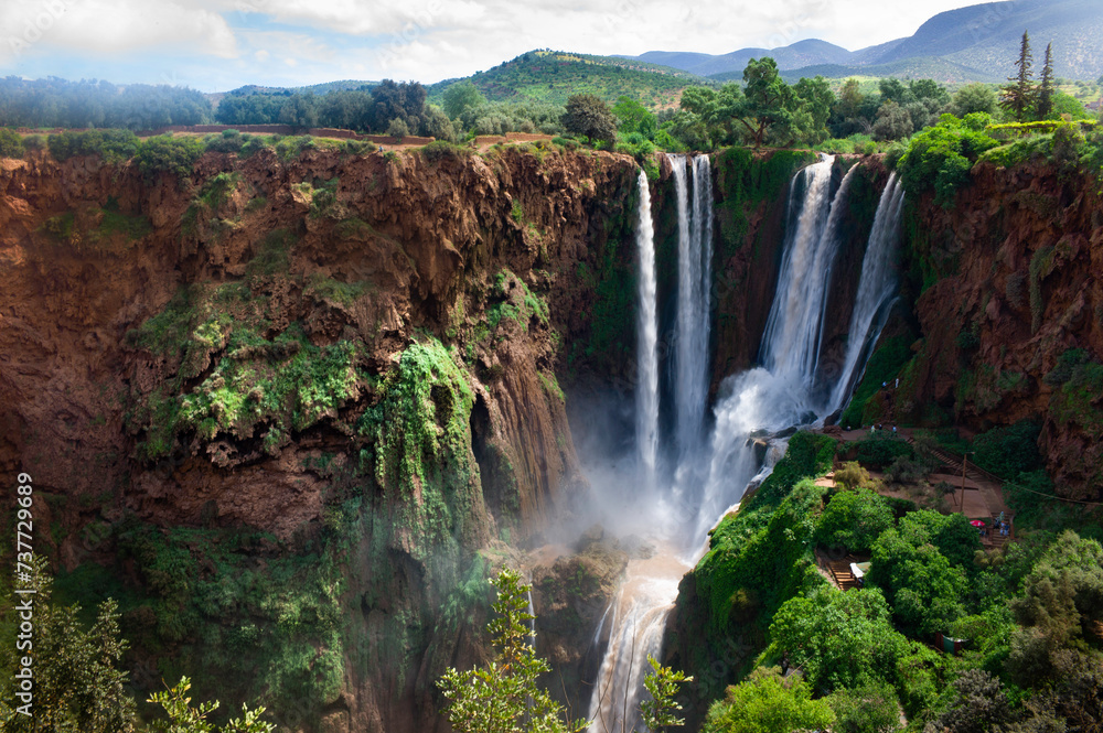 Gigantic Ouzoud Waterfalls that empty into the El-Abid River in the Grand Atlas mountains in Morocco, Africa