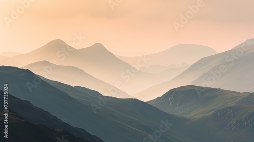 Tranquil dusk in the mountains, last light painting peaks in soft hues