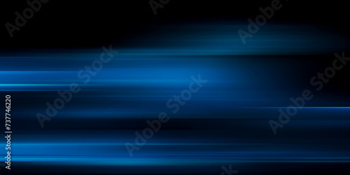Abstract blue neon speed light effect on black background photo