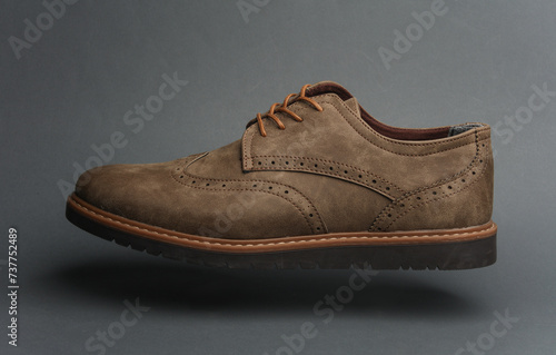 Leather Brogue shoe on a dark gray background