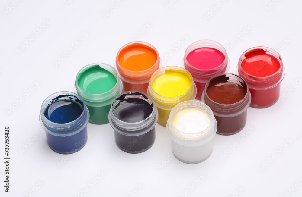 Set of gouache paints in bottles on a white background. Children's creativity Set of gouache paints in bottles on a white background. Children's creativity