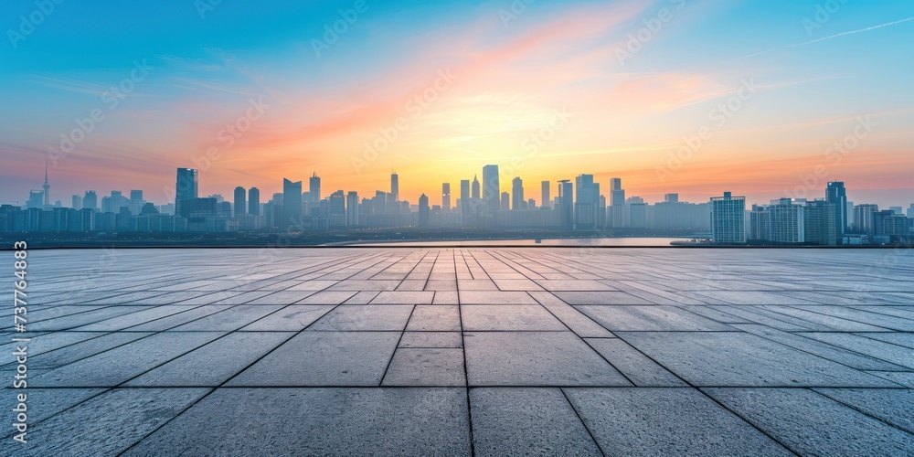 empty concrete with city skyline and sunset view 