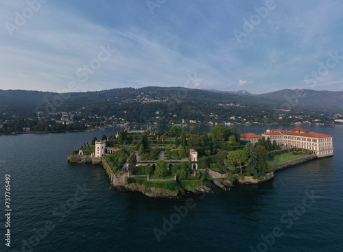 Lake Maggiore, island, Isola Bella, Italy. Panorama at sunrise on Lake Maggiore aerial view. Isola Bella and Stresa town aerial panoramic view.