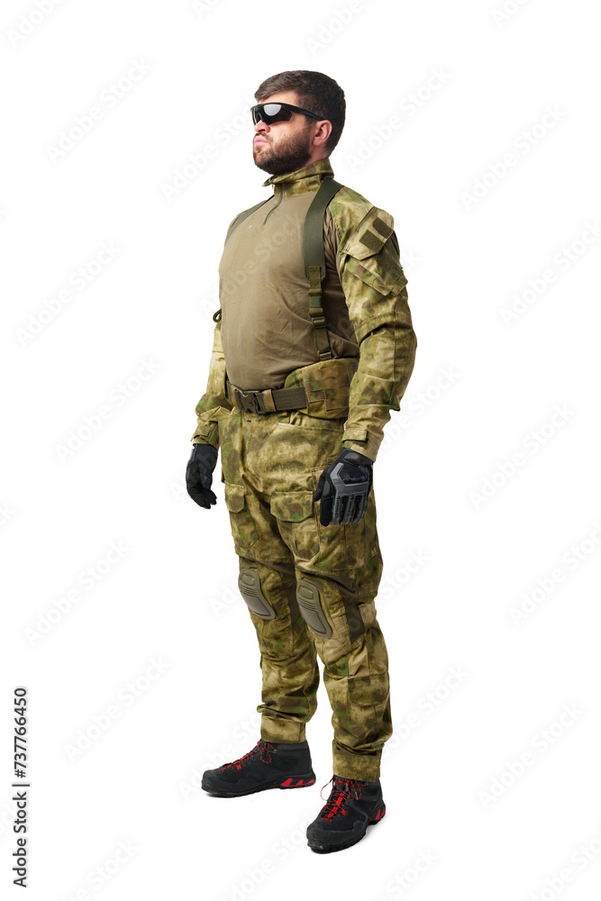 Full length portrait of man soldier wearing ammunition on white background