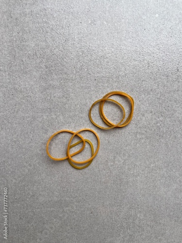 Red rubber band . Elastic bands yellow. Karet gelang kuning. photo