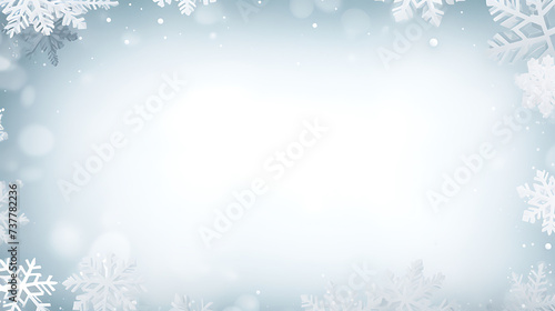 Snowflakes border with a soft blue gradient background. Winter holiday composition with copy space. Christmas and New Year celebration concept. Suitable for design in seasonal greeting cards, banners © hasara