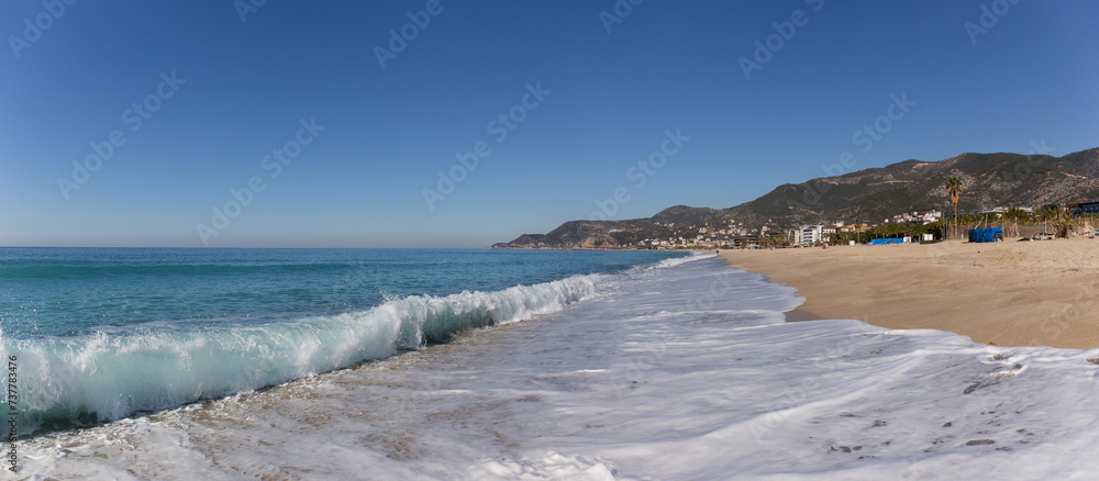 Panoramic view of the Mediterranean Sea and Cleopatra Beach in Alanya during sunny weather in February. Panoramic view of the Mediterranean Sea and Cleopatra Beach in Alanya during sunny weather in February.