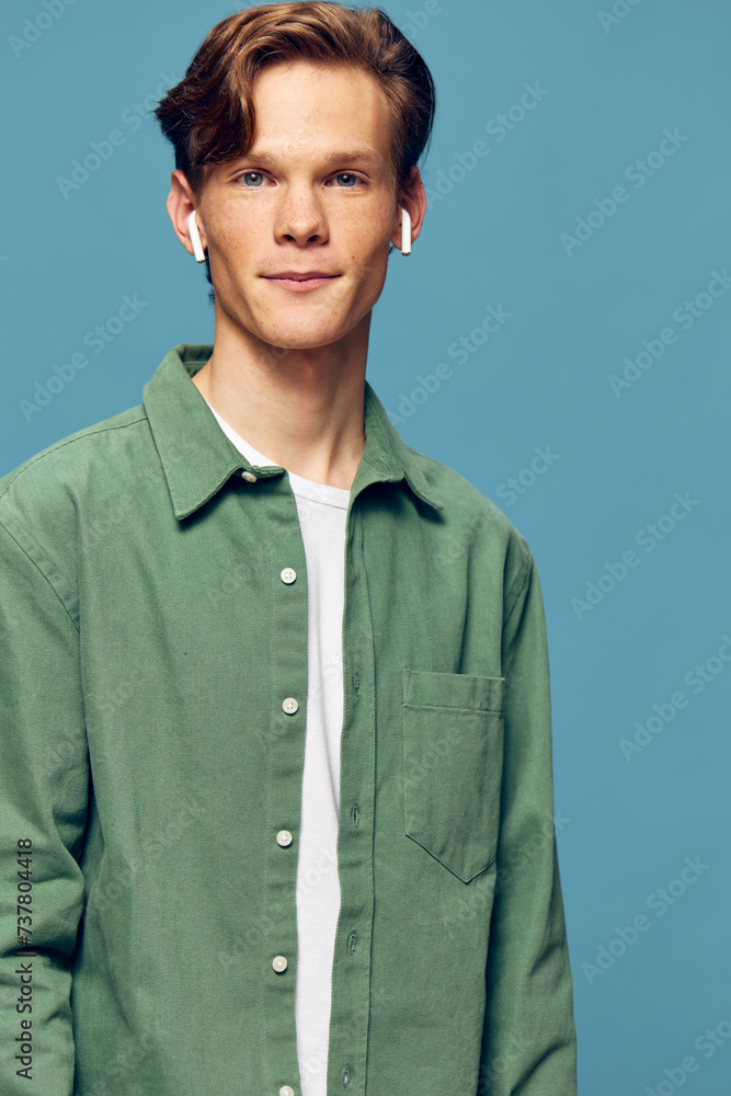 Young man in casual outfit posing, studio portrait, confident look. Young man in casual outfit posing, studio portrait, confident look.
