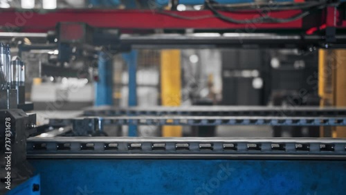 Wallpaper Mural Aluminum panels move along a conveyor belt in a factory for the production of high-tech products Torontodigital.ca