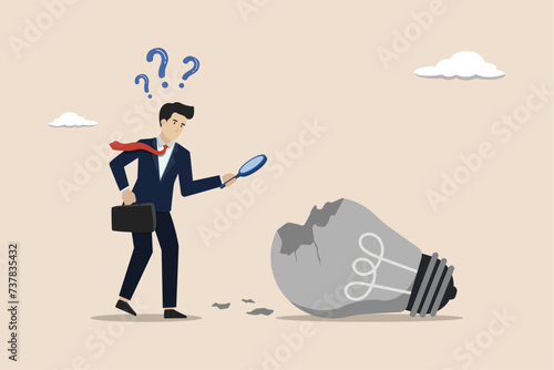 Looking for solutions to the causes of business failure, analyzing failed ideas, businessman analyzing broken light bulb ideas using a magnifying glass.