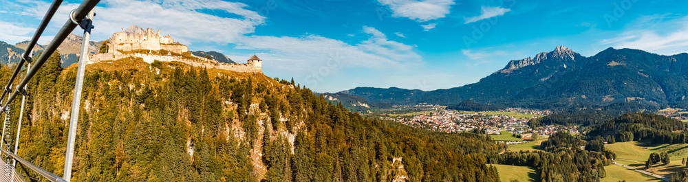 High resolution stitched alpine summer panorama at the famous Highline 179 suspension bridge and the Ehrenberg castle ruins near Reutte, Tyrol, Austria