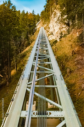 Fototapeta Naklejka Na Ścianę i Meble -  Geometric alpine summer view at the famous Highline 179 suspension bridge and the Ehrenberg castle ruins near Reutte, Tyrol, Austria