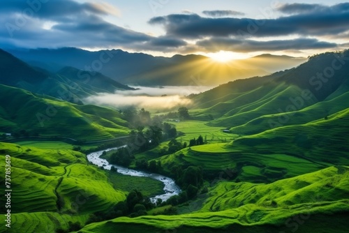 Incredible panoramic view of vibrant sunrise illuminating picturesque mountain rice paddies © Russell Zanaggy