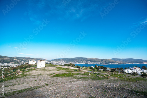 The windmills of Bodrum are a collection of stone buildings that were constructed in the 18th century and were used to grind grain into flour located on the hills between Bodrum and Gumbet,  Yalikavak photo