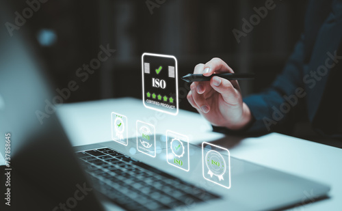 ISO standards quality control, assurance and warranty business technology concept. Touching on screen with ISO and globe icons on smart background. ISO Standard certification. Modern ISO banner.