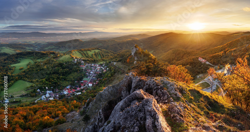 Beautiful Panoramic View of Colourful Fall Forest and Mountains in Vrsatec landscape. Sunset or Sunrise Sky Composite. Slovakia