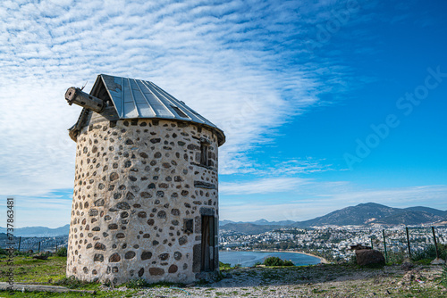 The windmills of Bodrum are a collection of stone buildings that were constructed in the 18th century and were used to grind grain into flour located on the hills between Bodrum and Gumbet,  Yalikavak photo