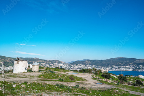 The windmills of Bodrum are a collection of stone buildings that were constructed in the 18th century and were used to grind grain into flour located on the hills between Bodrum and Gumbet,  Yalikavak photo