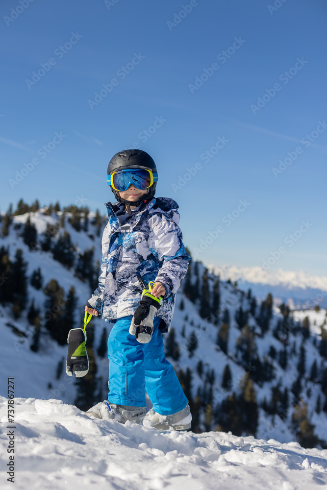 Children and adults, happy family in winter clothing at ski vacation, skiing, winter Children and adults, happy family in winter clothing at ski vacation, skiing, winter