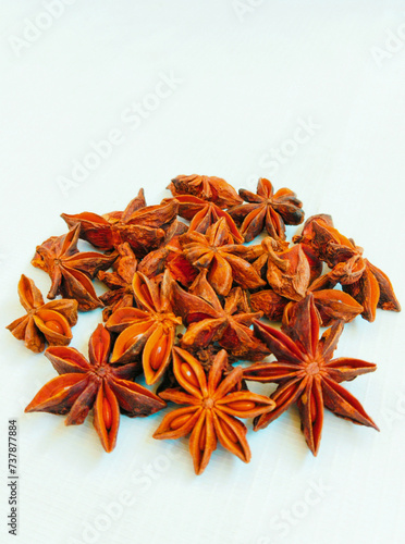 Aromatic star anise spice Illicium verum badian
chinese staranise seed star-aniseed star-of-anise a food ingredient closeup stock image  photo