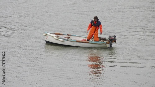 Bags of scallops going into estuary for later