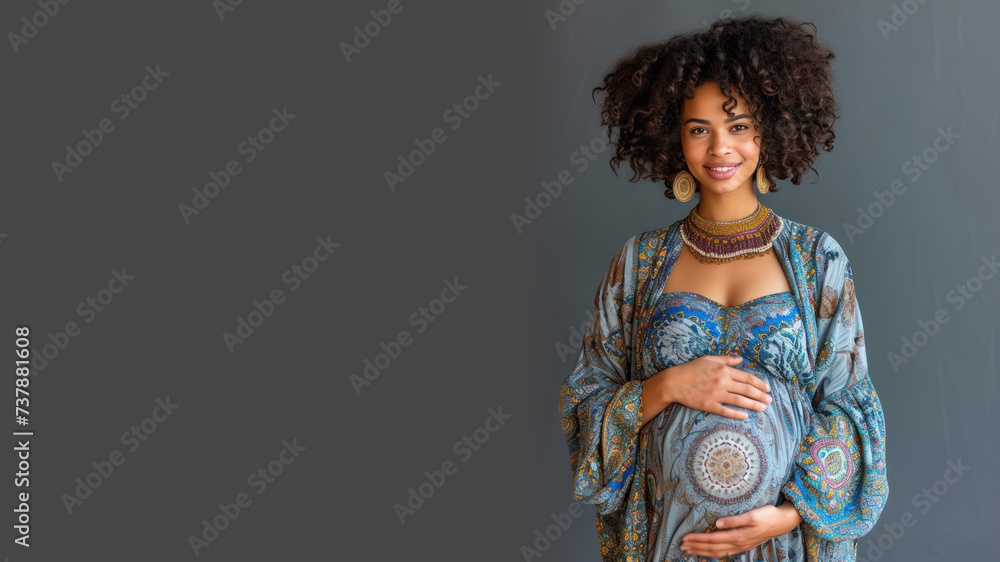 Afro pregnant woman with pregnancy belly, in soft blue clothes