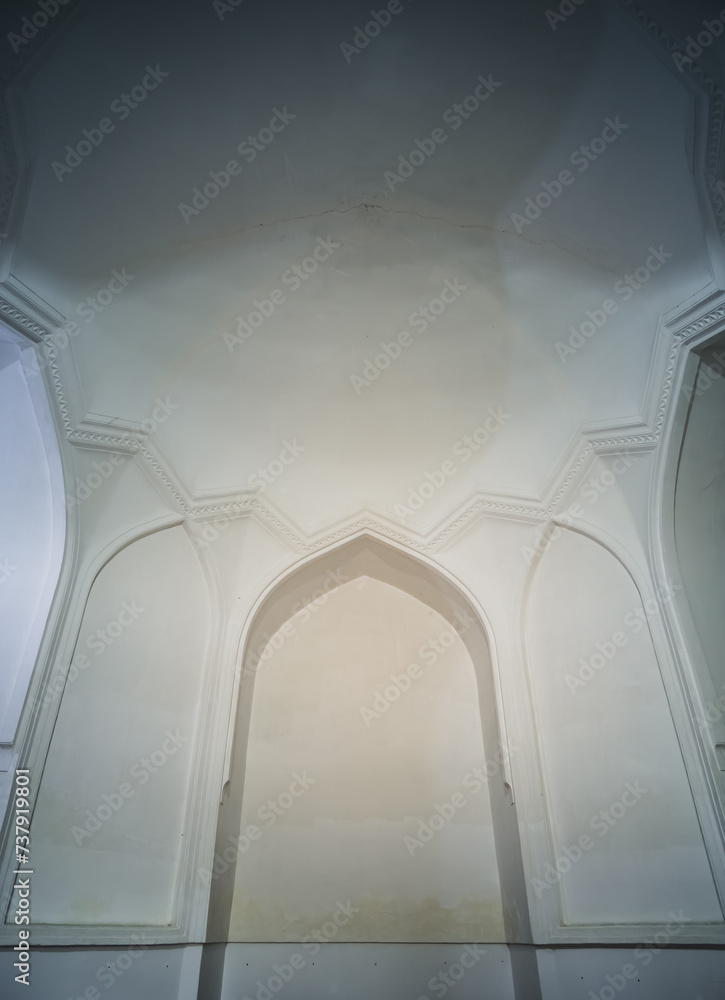 Fototapeta premium Facade of the Gur Emir mausoleum with mosaic brick walls in the ancient city of Samarkand in Uzbekistan, oriental architecture