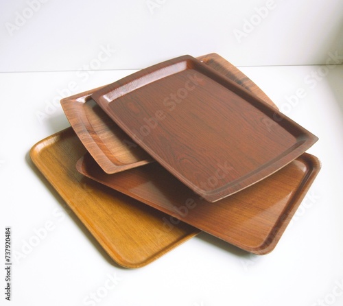 mid century modern kitchen trays in teak wood and rosewood from the 1960s.