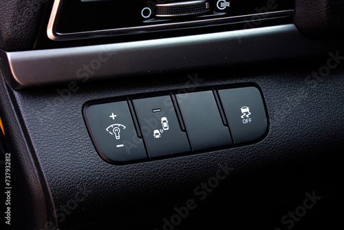 Driver Knee Pad Panel modern car. Car Hud Switch. ESP off Switch. Car light switch. Control buttons combination Details. dimming light button. © Best Auto Photo