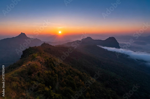 Aerial view of sunrise on the mountain at Phu Chi Fa, Loei, Thailand