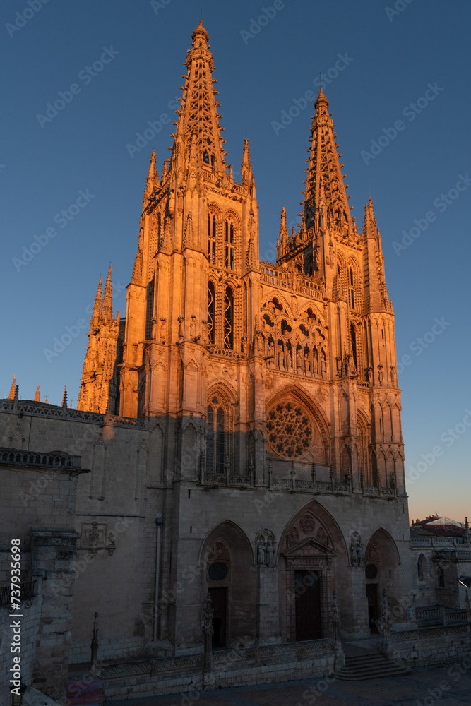 Gothic cathedral facade of the city of Burgos at sunset in a suuny day. Castilla y Leon, Spain.