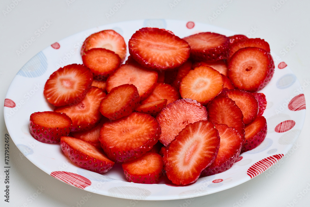 cleaned strawberries on a plate ready to be served. cleaned strawberries on a plate ready to be served.