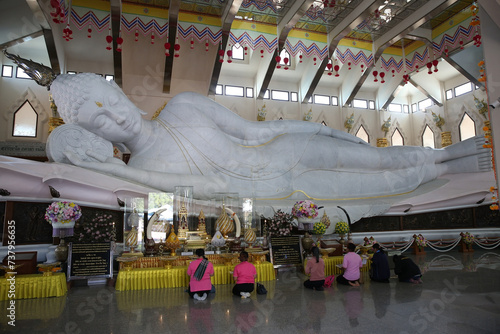 Wat Pa Phu Kon indoor: Buddhist temple, Na Yung (Udon district), Thailand. Religious traditional national Thai architecture. Beautiful landmark, architectural monument, interior. Lying Buddha