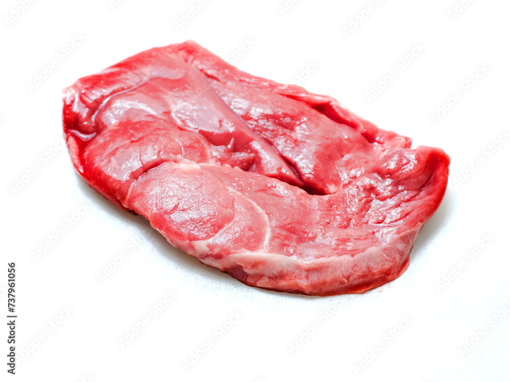 One uncooked boneless lamb leg steak on white background. Premium high quality meat product of agriculture industry. Butcher craft and skill. Food supply chain.