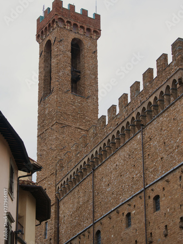 Tower and wall of the Palazzo del Bargello in Florence, Italy. Partial view