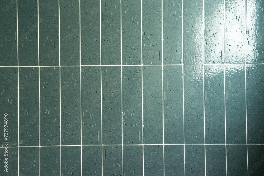 Green tile wall texture background. Floor tiles pattern. Floor tiles background.