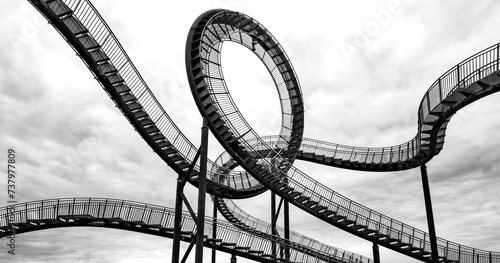 Photos Viewing platform in the Angerpark public recreation area in Duisburg Germany is a landmark and tourist attraction sight with curved catwalks and loop in the shape of a roller coaster