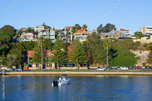 Skyline of bars and boats along the waterside of Swan River in Fremantle, Western Australia photo